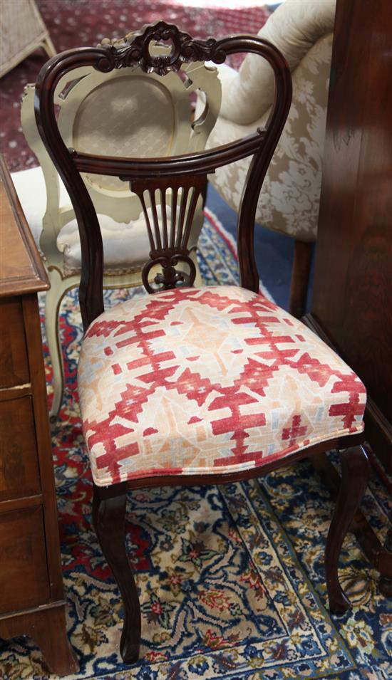 A pair of Victorian mahogany balloon backed chairs, c.1850